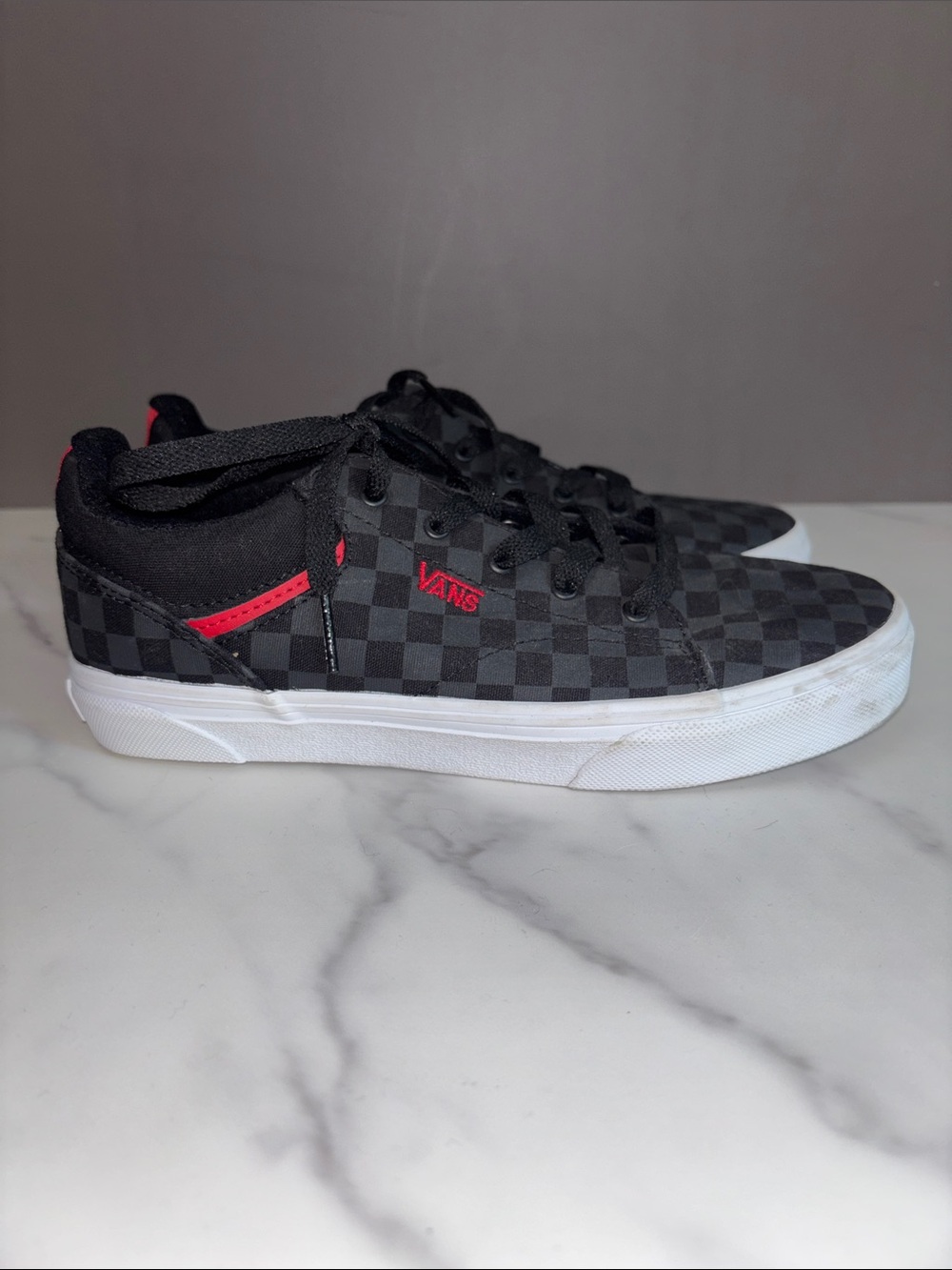 Vans Kids Checkerboard Low Top Sneakers in Black and Red